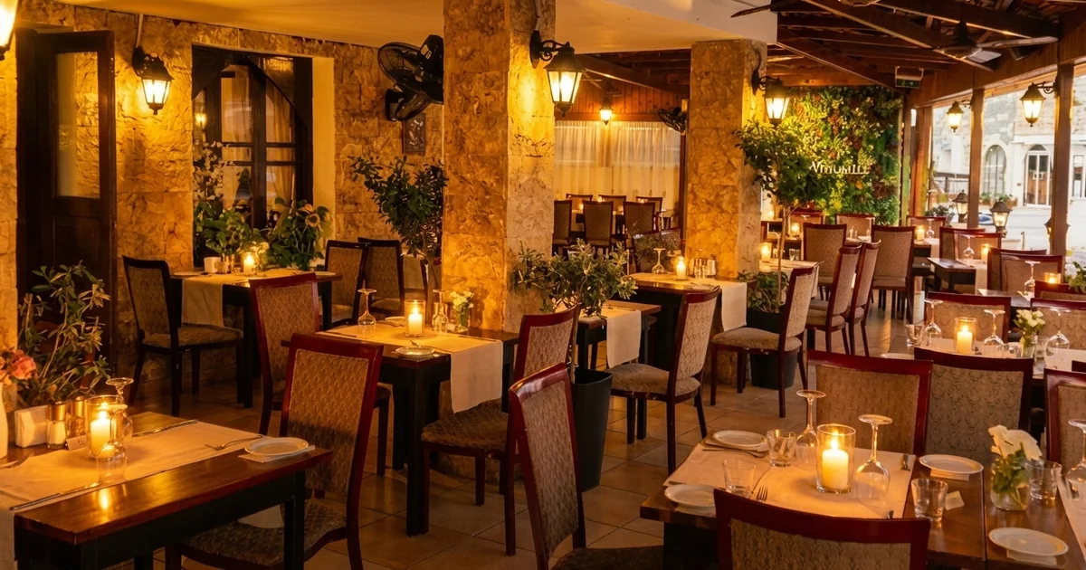 The Windmill Paphos — warm evening ambiance on the covered terrace